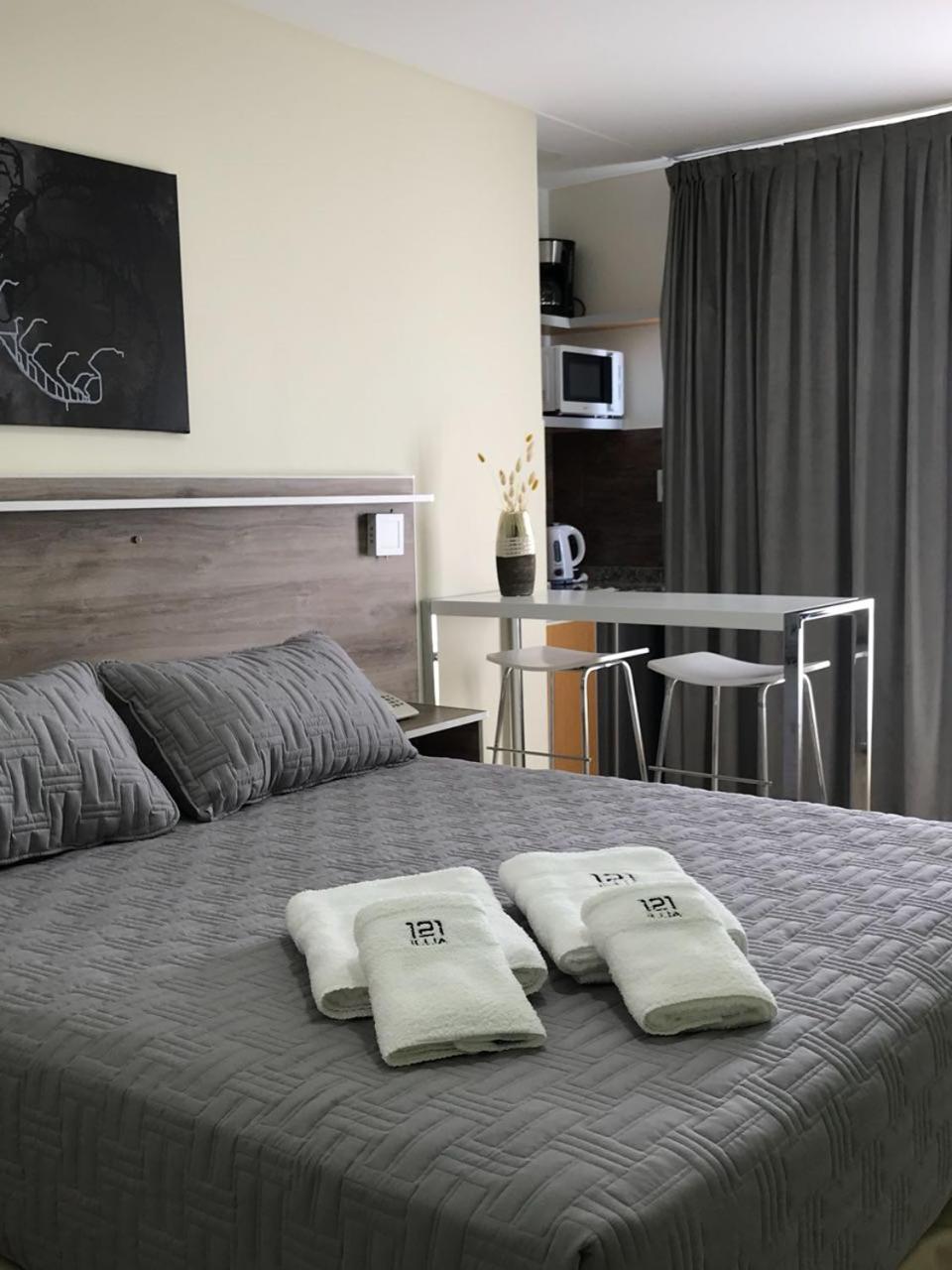 Illia 121 Apart Hotel Neuquén Eksteriør bilde