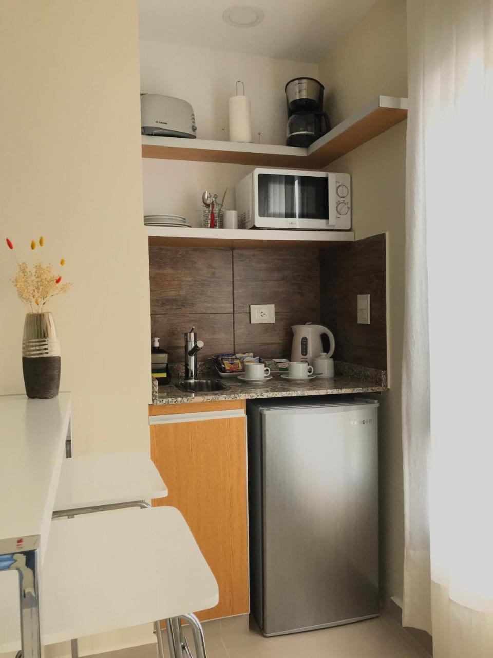 Illia 121 Apart Hotel Neuquén Eksteriør bilde